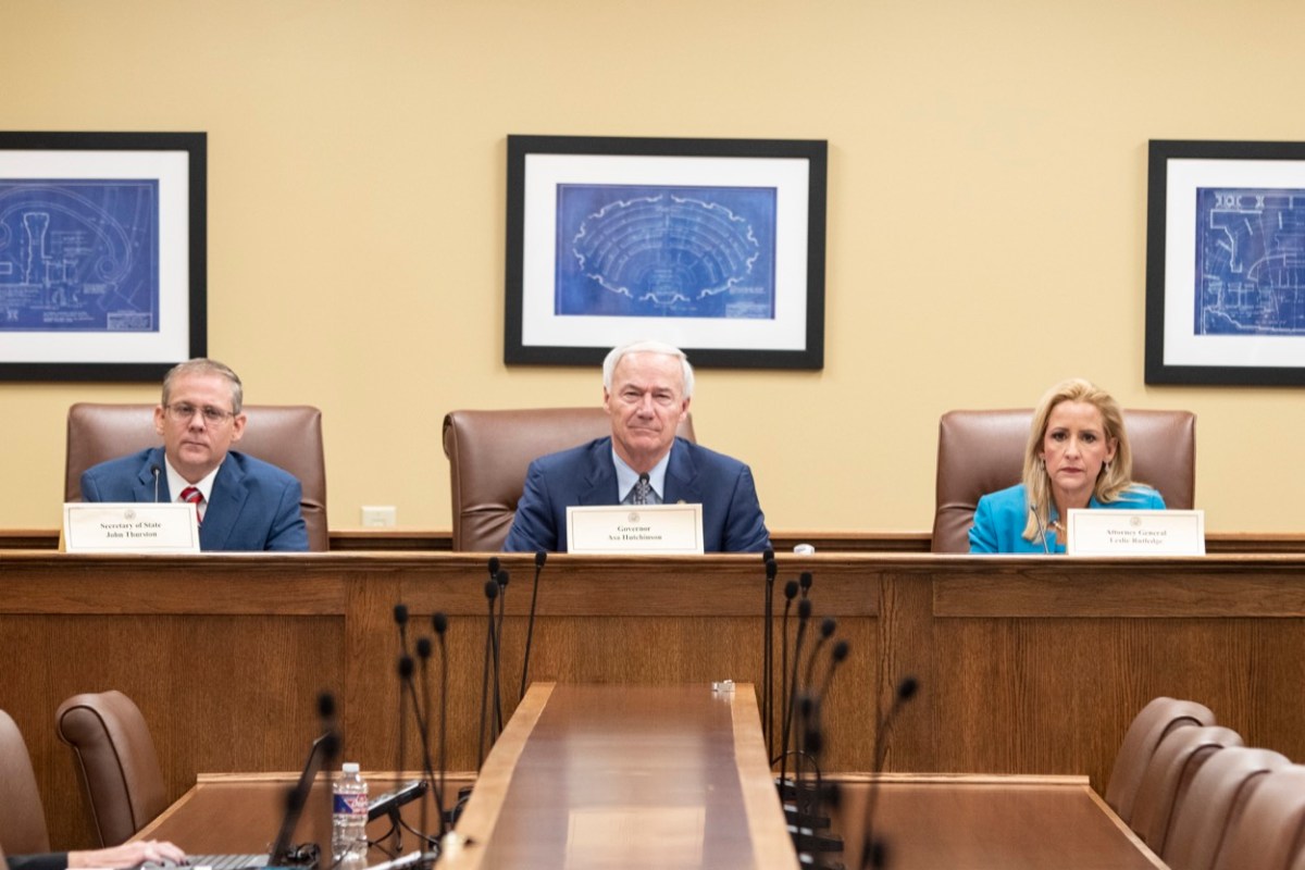 pic of BOARD OF APPORTIONMENT: (From left) Secretary of State John Thurston, Governor Hutchinson and Attorney General Leslie Rutledge.